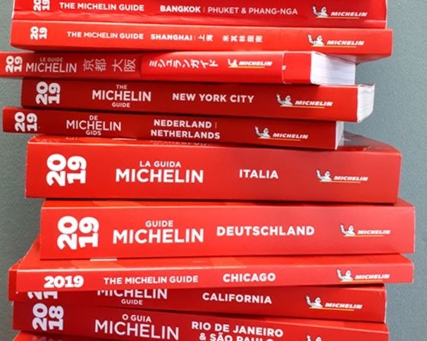 Компания Michelin приостановила выпуск своих ресторанных гидов